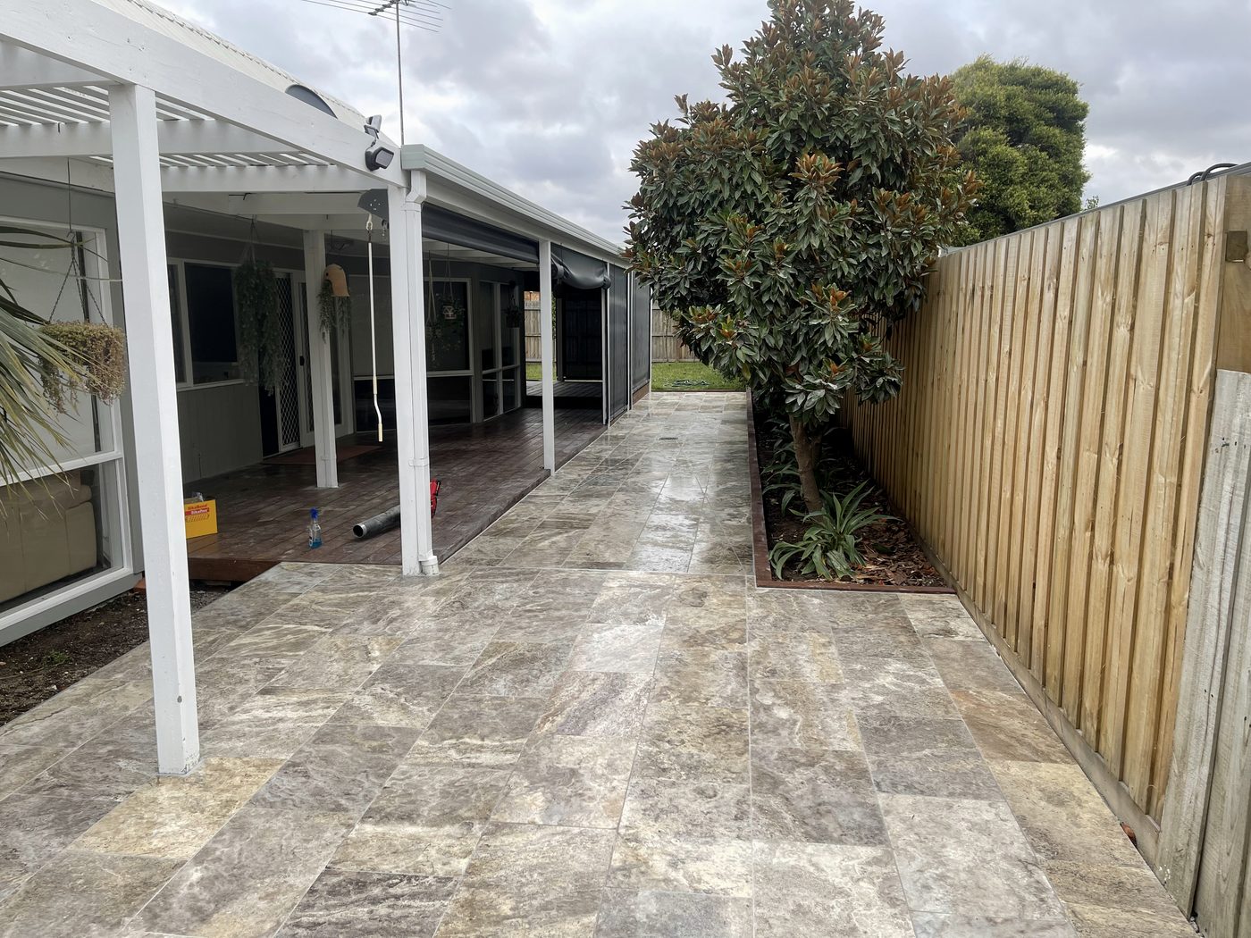 Silver travertine paving — Geelong region project